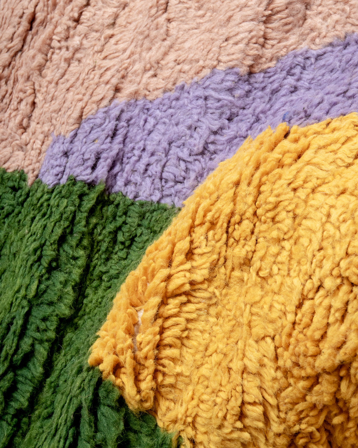 Modern, designer, handcrafted Berber rug from Morocco. Beniourain carpet with beautiful colours and patterns and fluffy wool texture.